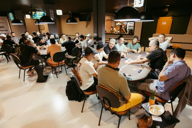Players intensely focused at a vibrant poker tournament
